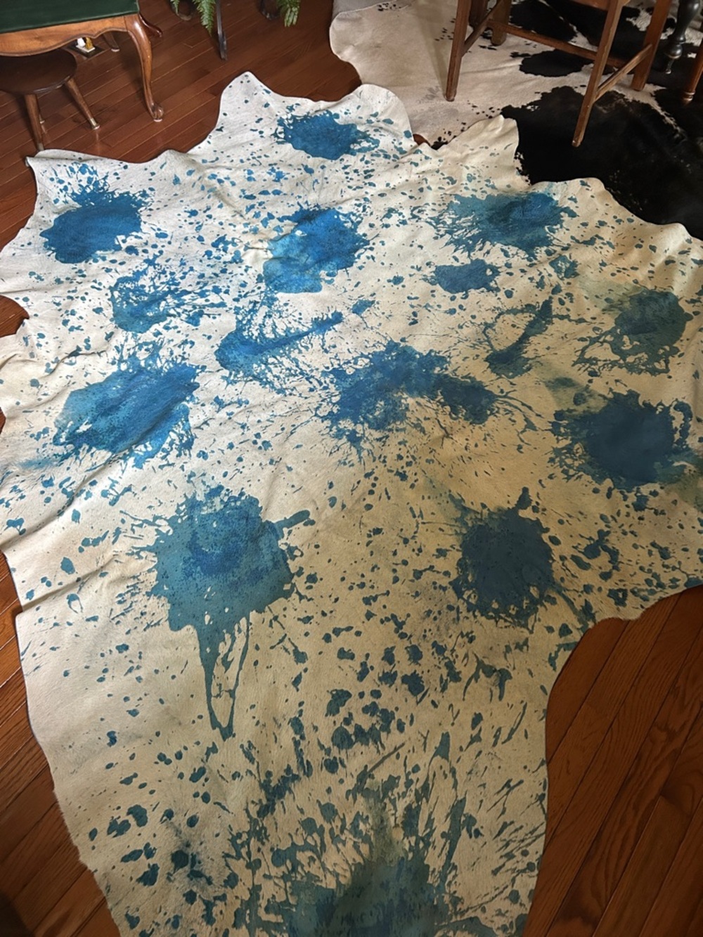 Hand-Painted Cowhide Rug with Blue Splatter